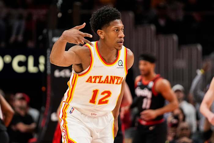 Atlanta Hawks forward De'Andre Hunter reacts after making a shot against the Portland Trail Blazers.